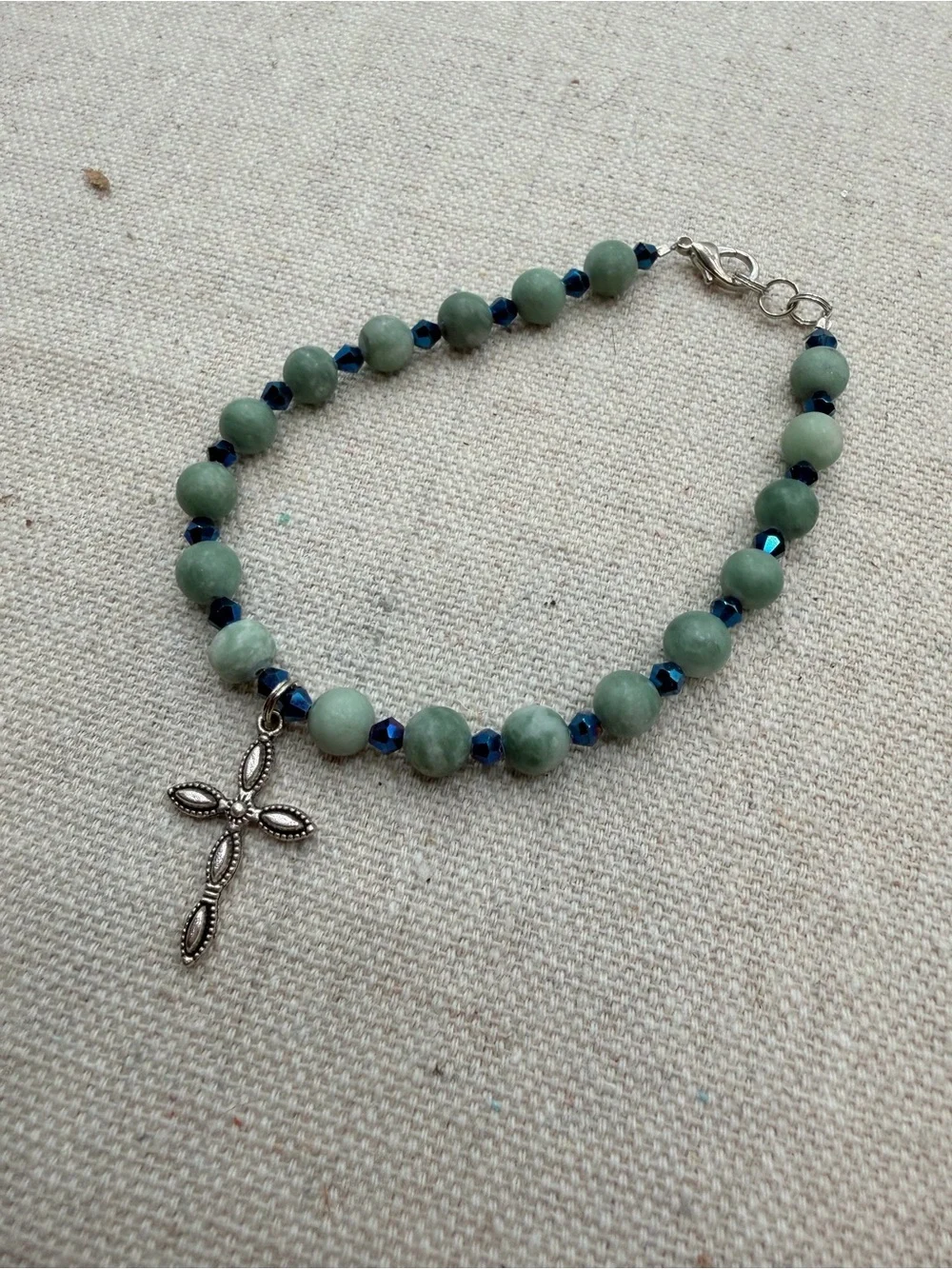Green Beaded Bracelet with Silver Cross Charm